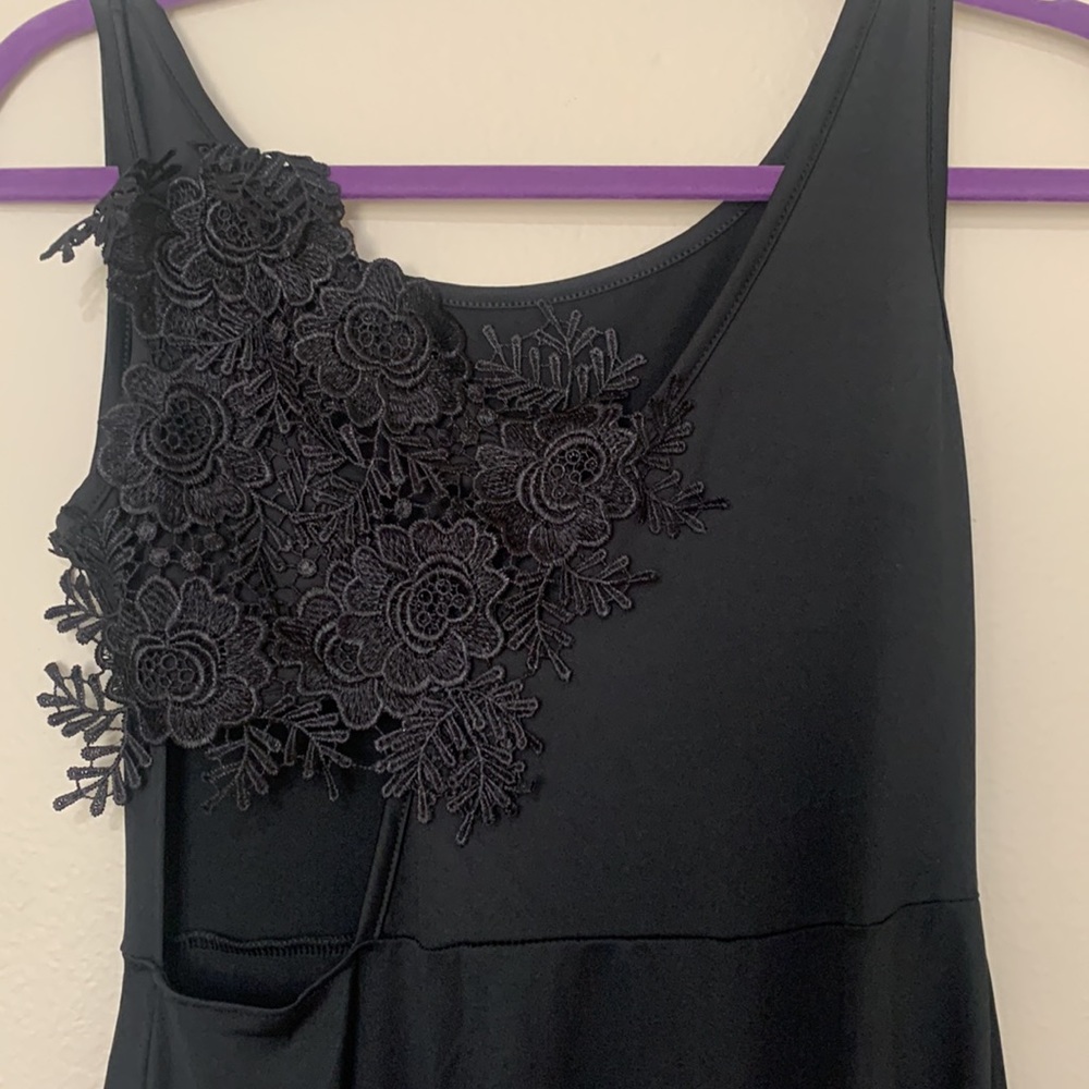 Black dress with side cut out and lace design